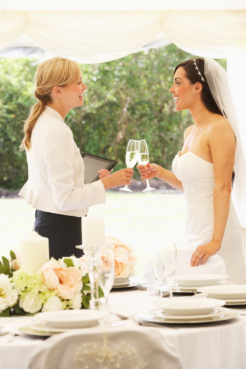 Bride With Wedding Planner In Marquee